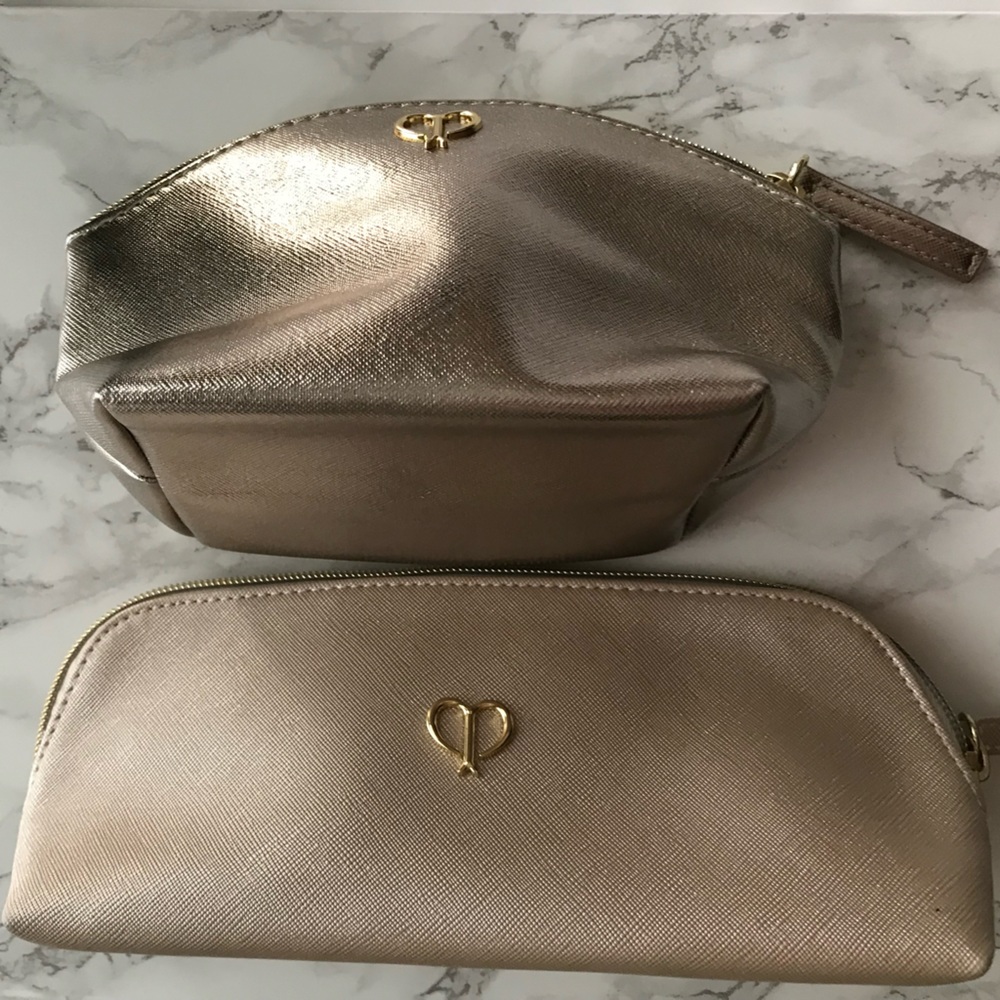 Cle’ De Peau Beaute’ cosmetic bags .Two cosmetic bags .